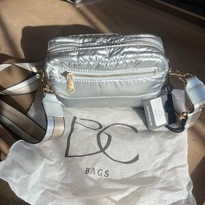 Silver crossbody puffer bag NWT